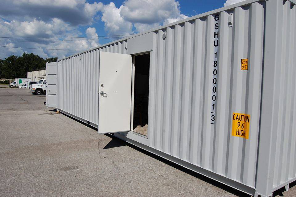 Container unit exterior with entry door open