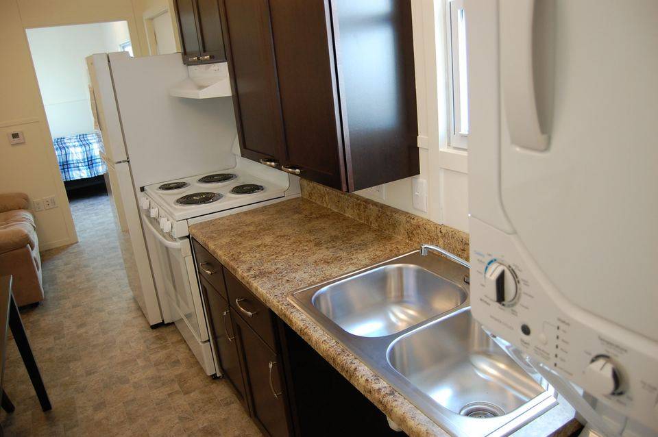 Kitchen counter with sink and range