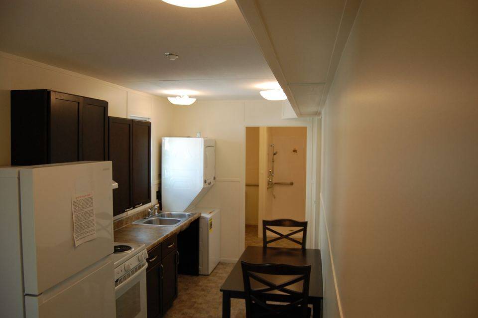 Kitchen and dining area, view down the unit
